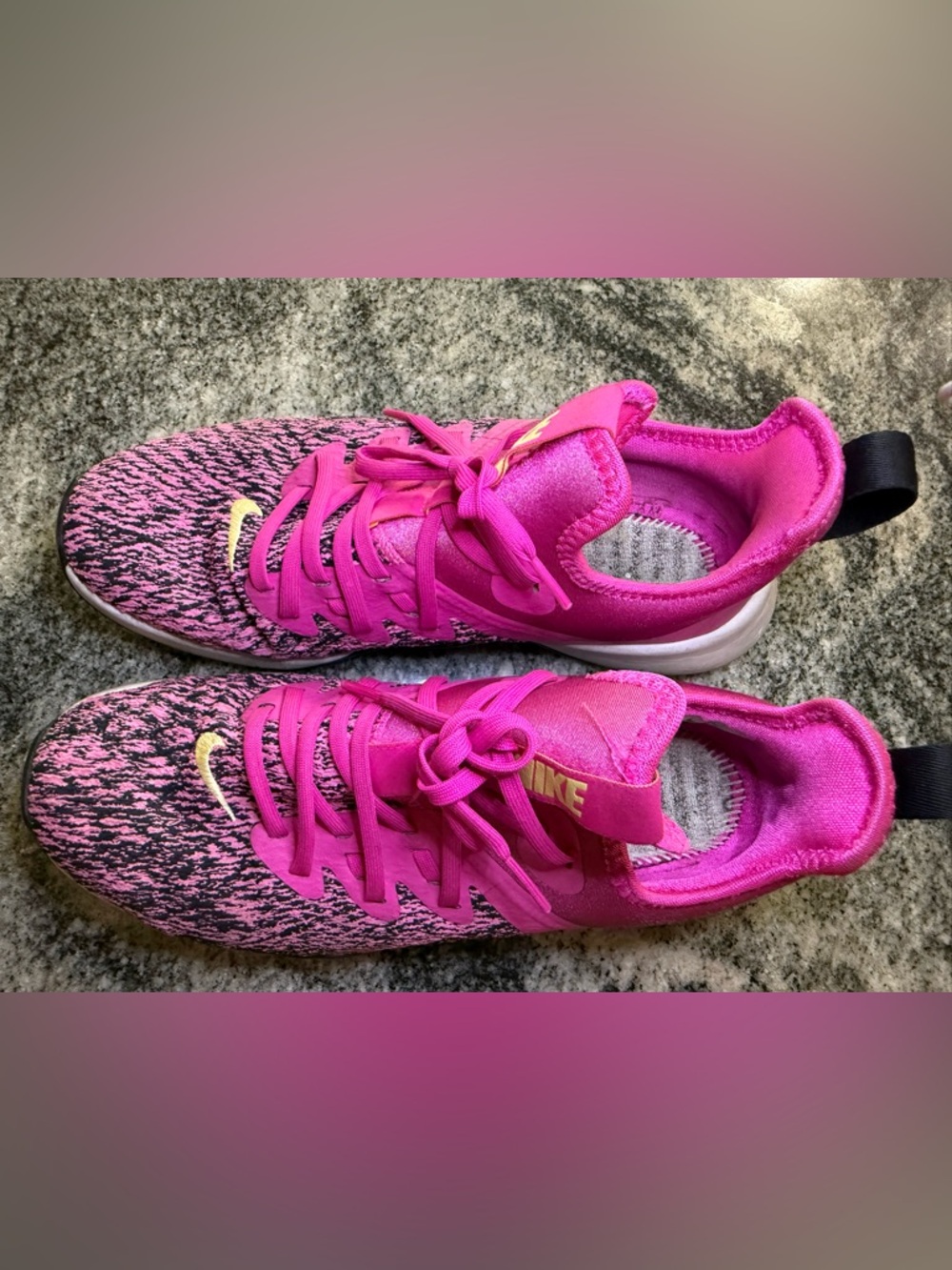 Nike Pink Knit Athletic Sneakers with Gold Accent